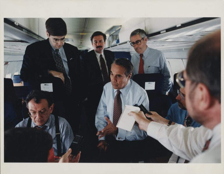 96 camp_pf bentley_dole in plane discussing strategy