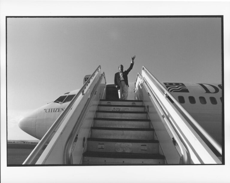 96 camp_pf bentley_dole waving from plane steps